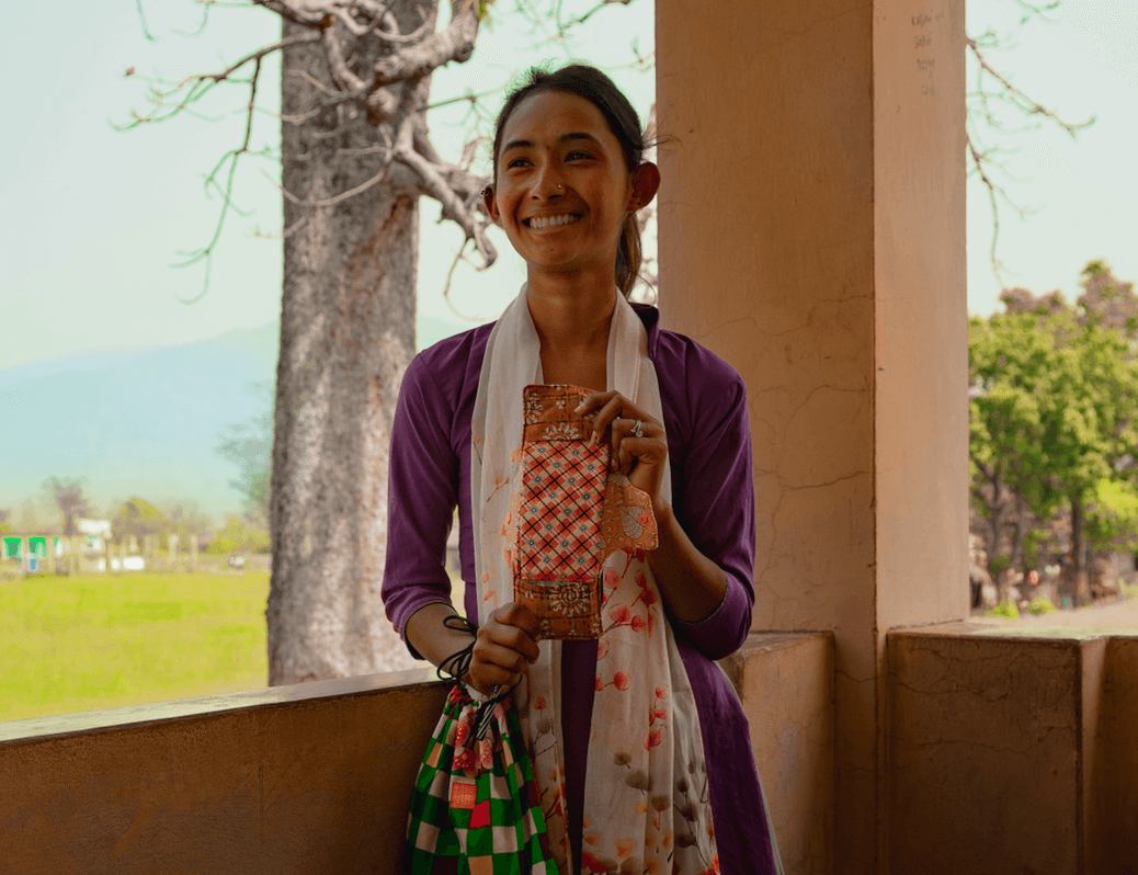 Girls with menstrual hygiene and education kit from Days for Girls fighting period poverty..