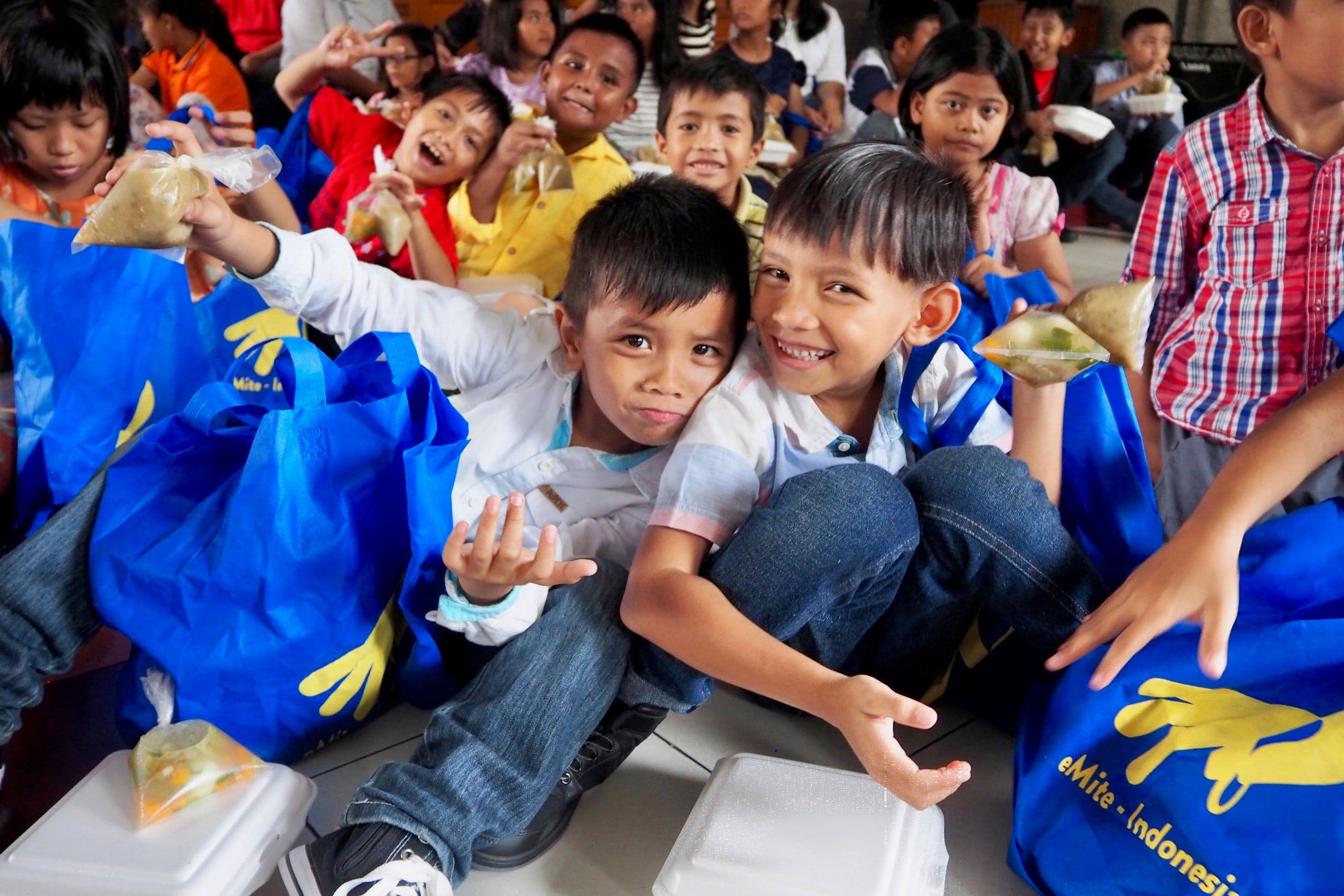 Indonesian boys with care packages