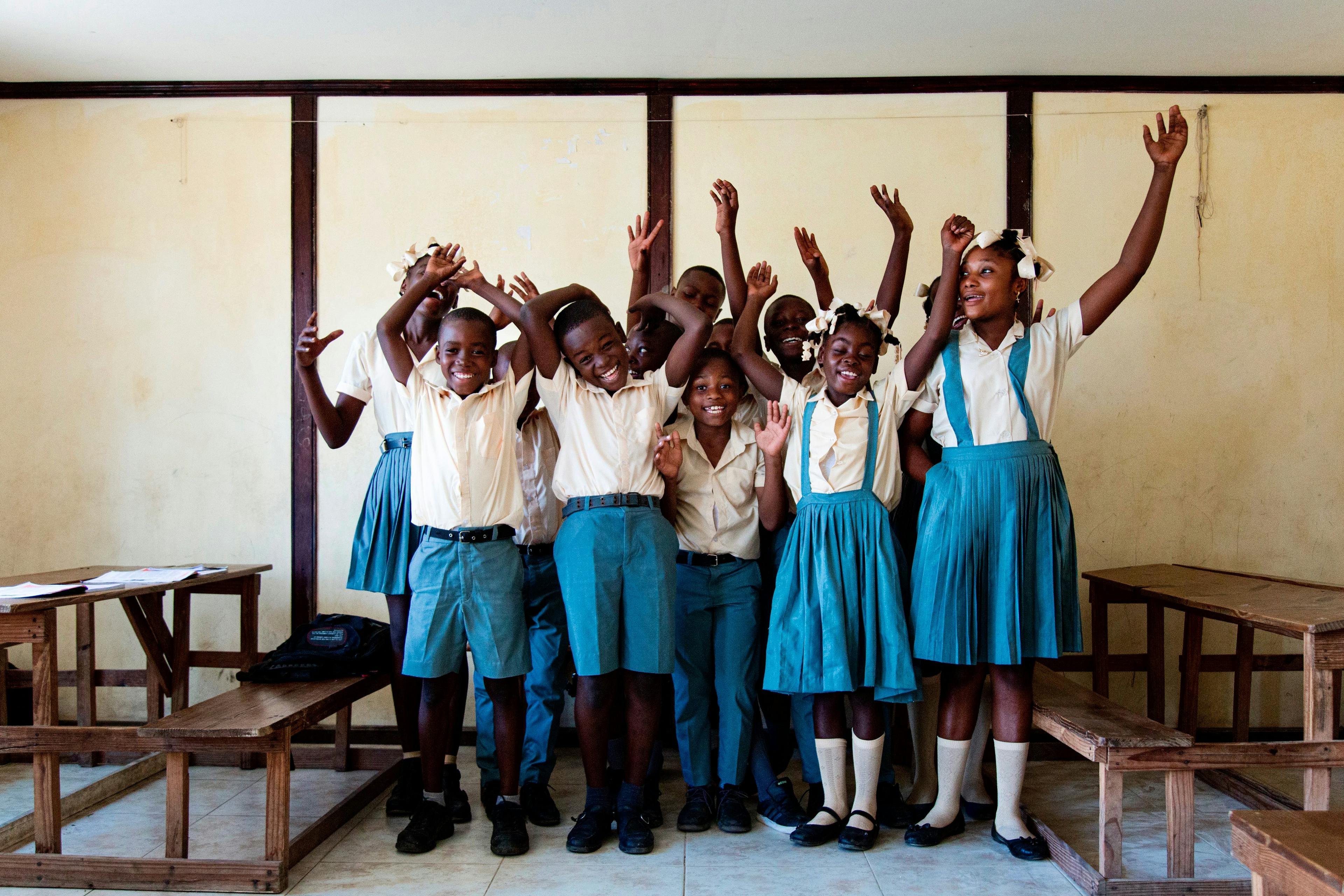 Beautiful Haitian children celebrating education